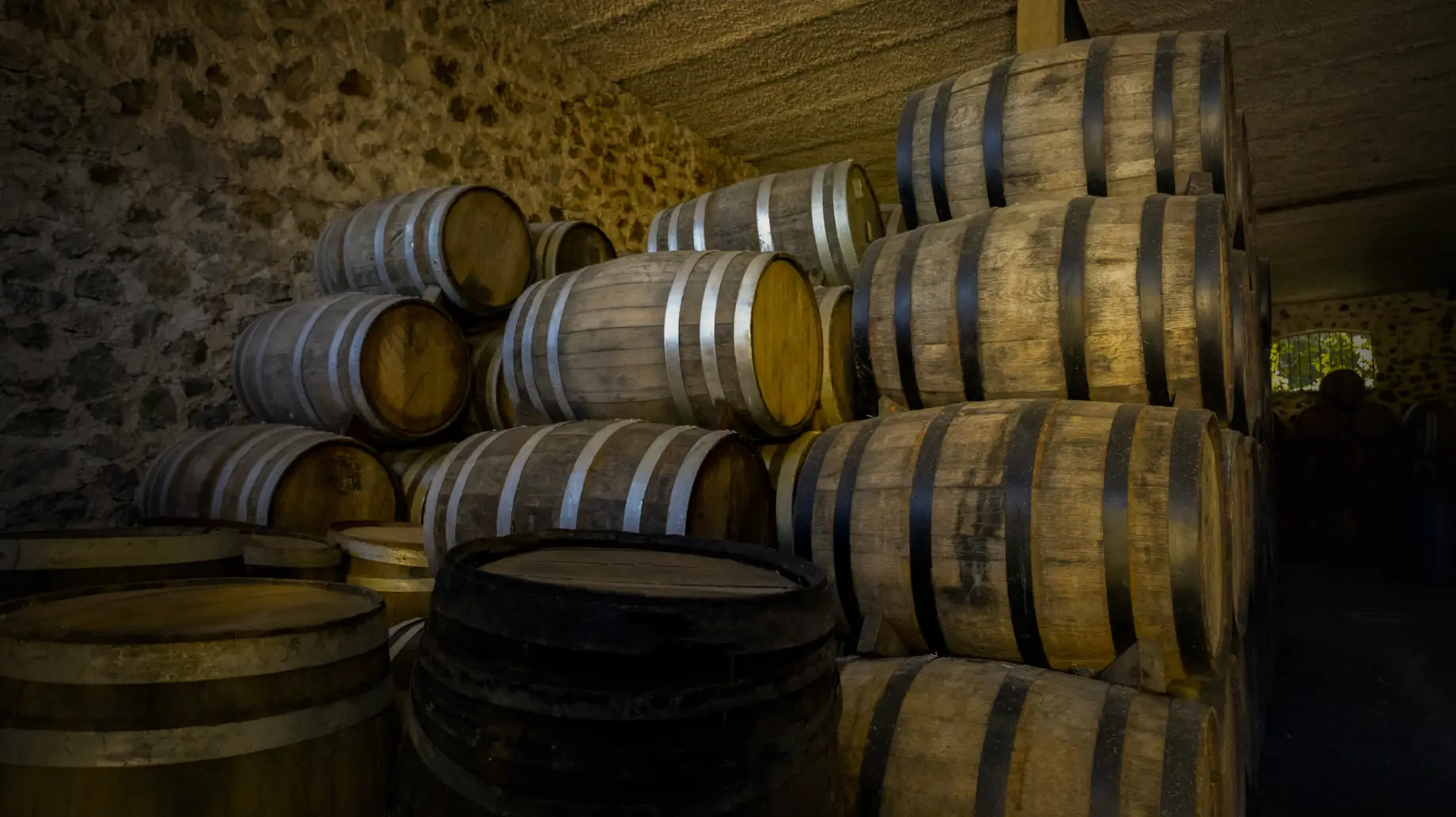 Tequila barrels in a cellar